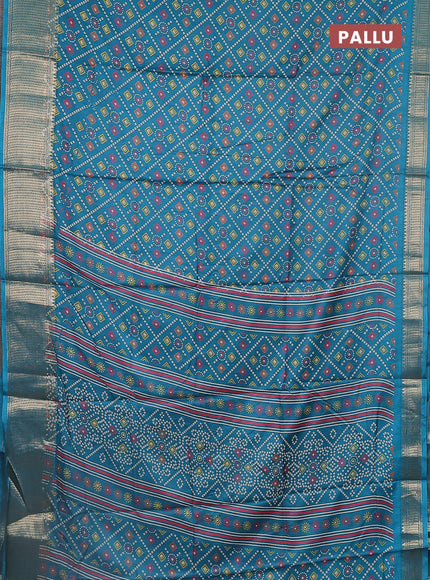 Semi dola saree teal green with allover bandhani prints and zari woven border