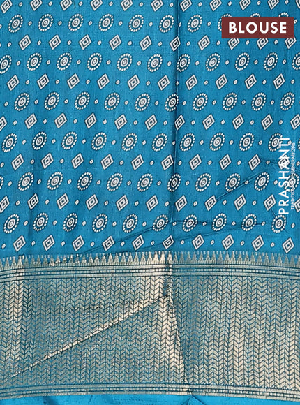 Semi dola saree teal green with allover bandhani prints and zari woven border