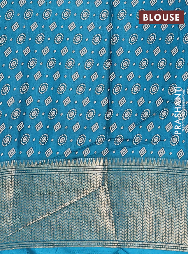 Semi dola saree teal green with allover bandhani prints and zari woven border