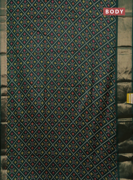 Semi dola saree dark green with allover bandhani prints and zari woven border