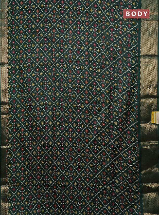 Semi dola saree dark green with allover bandhani prints and zari woven border