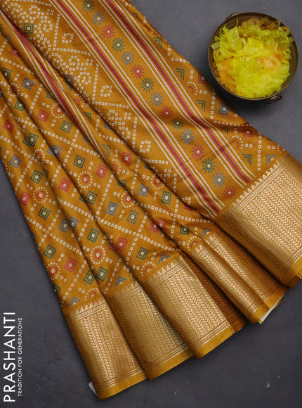 Semi dola saree mustard yellow with allover bandhani prints and zari woven border