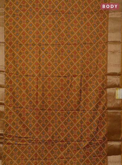 Semi dola saree mustard yellow with allover bandhani prints and zari woven border