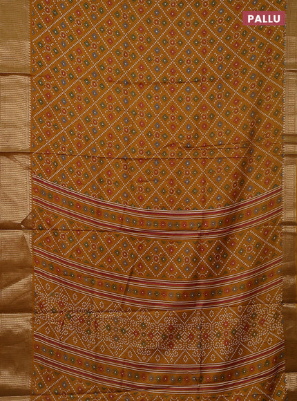 Semi dola saree mustard yellow with allover bandhani prints and zari woven border