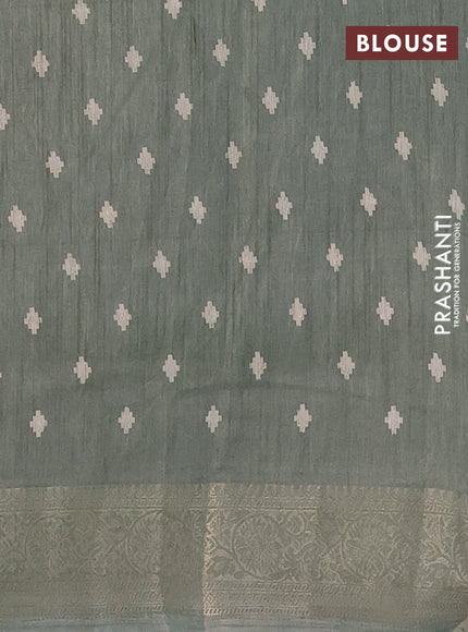 Semi dola saree green shade with allover prints and zari woven border