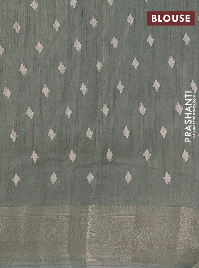 Semi dola saree green shade with allover prints and zari woven border