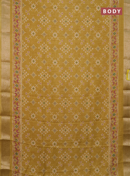 Semi dola saree yellow shade with allover prints and zari woven border