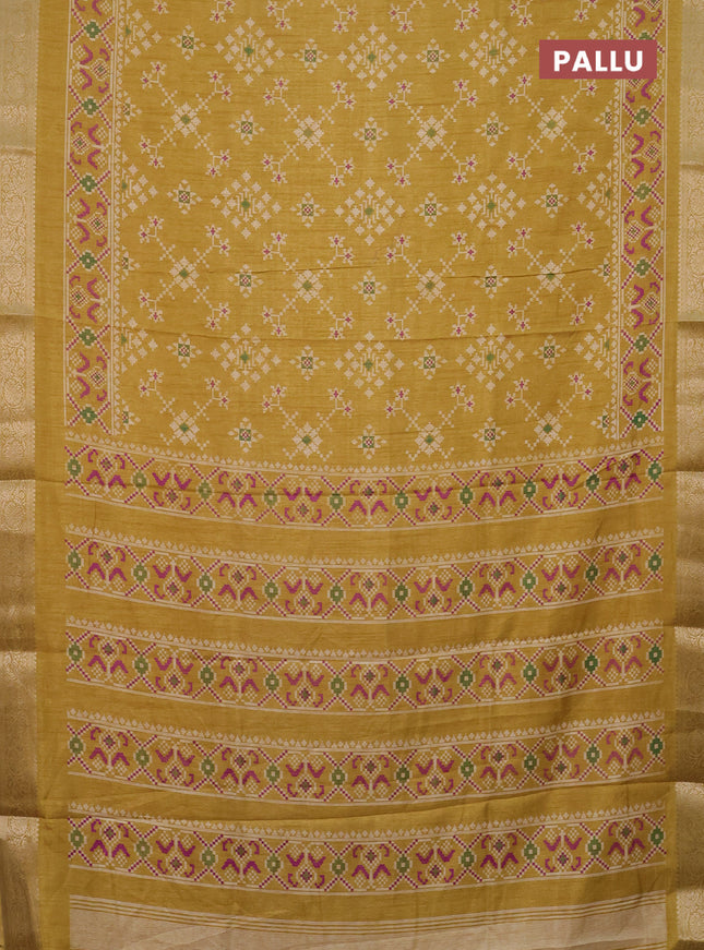 Semi dola saree yellow shade with allover prints and zari woven border