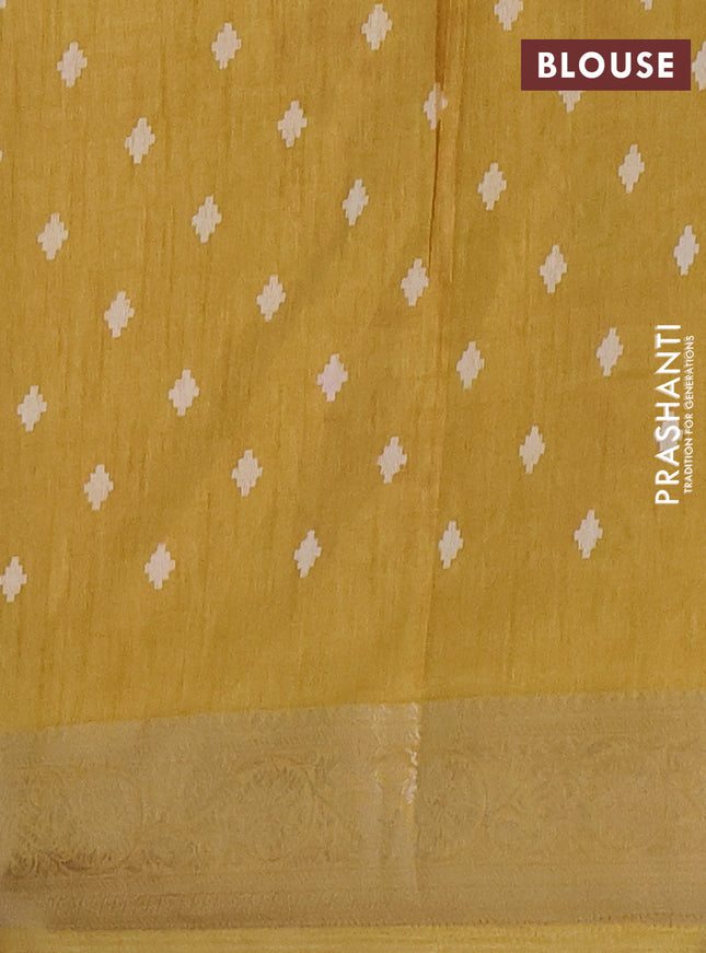 Semi dola saree yellow shade with allover prints and zari woven border
