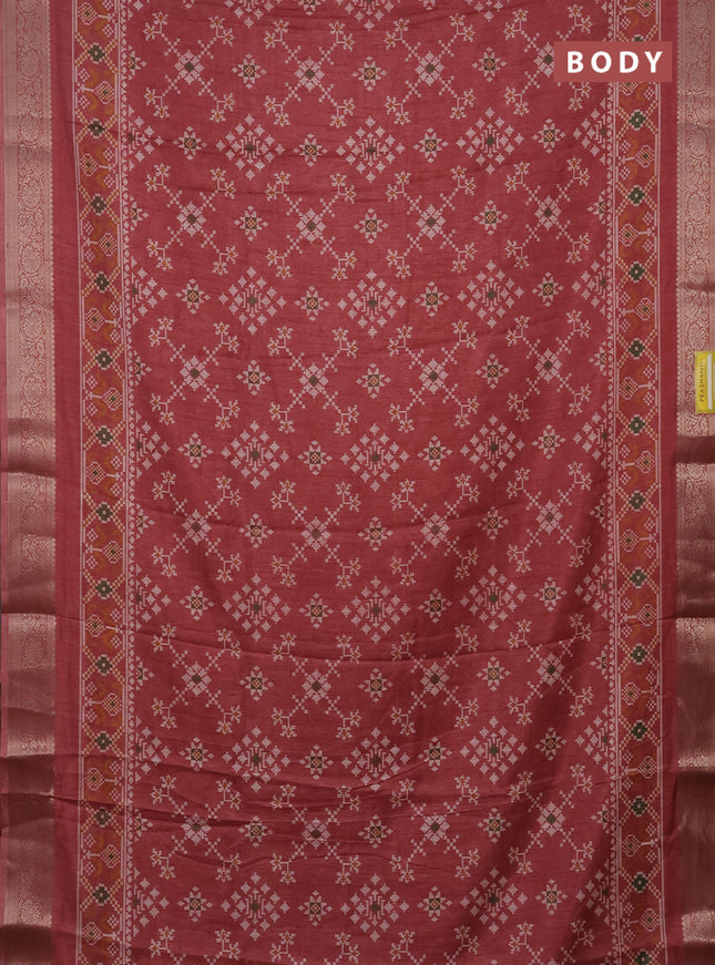 Semi dola saree rust shade with allover prints and zari woven border