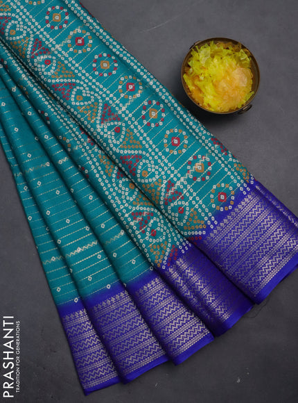 Semi dola saree teal green shade and blue with allover zari weaves & bandhani prints and zari woven border