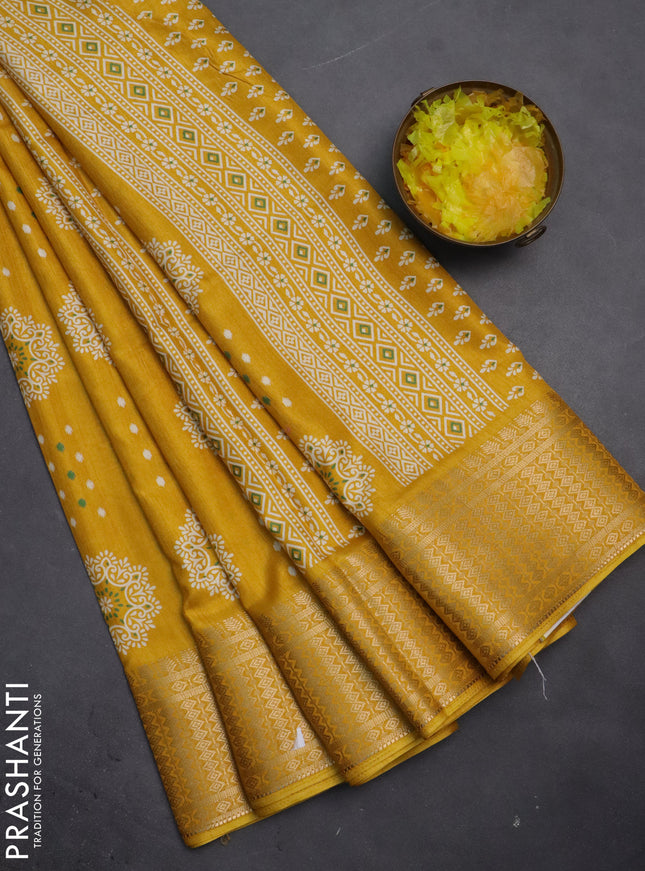 Semi dola saree mustard yellow with allover butta prints and zari woven border