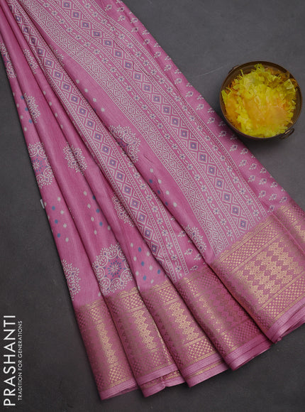 Semi dola saree lightpink with allover butta prints and zari woven border