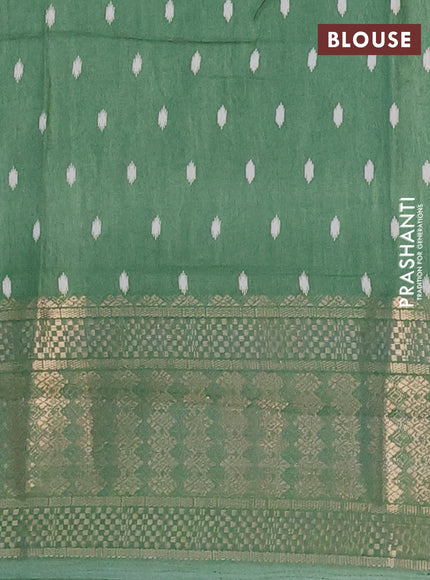 Semi dola saree green shade with allover butta prints and zari woven border