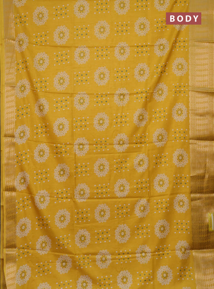 Semi dola saree yellow with allover butta prints and zari woven border