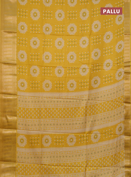 Semi dola saree yellow with allover butta prints and zari woven border