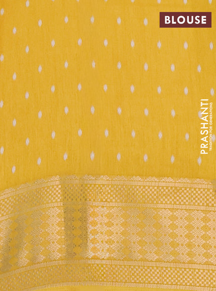 Semi dola saree yellow with allover butta prints and zari woven border