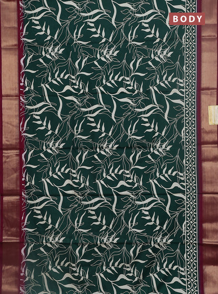 Semi dola saree dark green and wine shade with allover prints and zari woven border