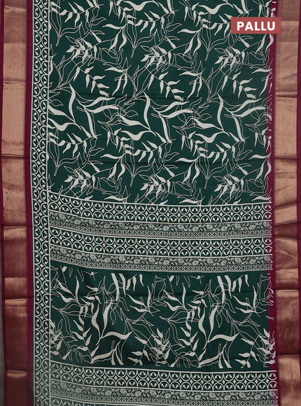 Semi dola saree dark green and wine shade with allover prints and zari woven border