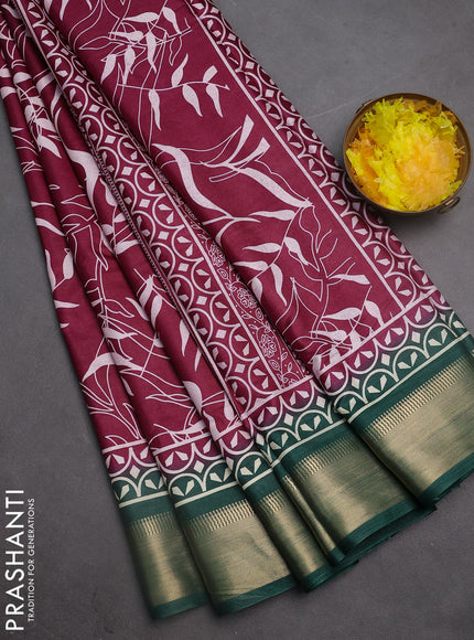 Semi dola saree wine shade and dark green with allover prints and zari woven border