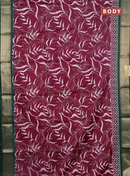 Semi dola saree wine shade and dark green with allover prints and zari woven border