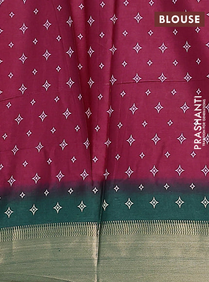 Semi dola saree wine shade and dark green with allover prints and zari woven border