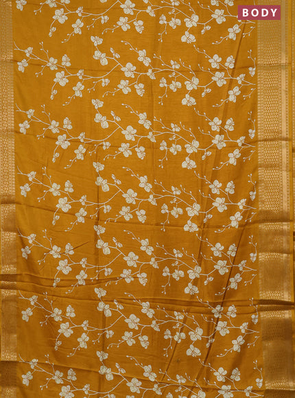 Semi dola saree mustard yellow with allover prints and zari woven border