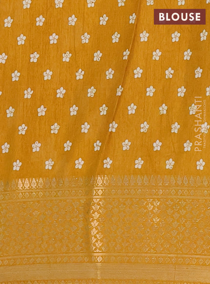 Semi dola saree mustard yellow with allover prints and zari woven border