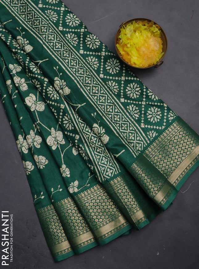 Semi dola saree dark green with allover prints and zari woven border