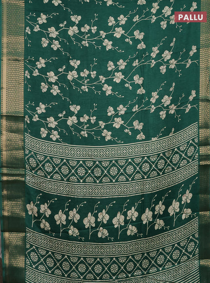 Semi dola saree dark green with allover prints and zari woven border