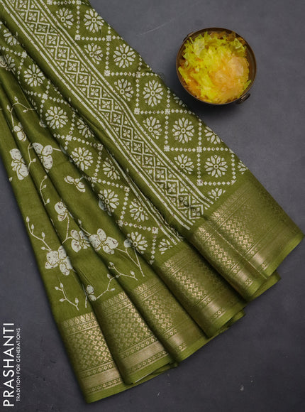 Semi dola saree mehendi green with allover prints and zari woven border