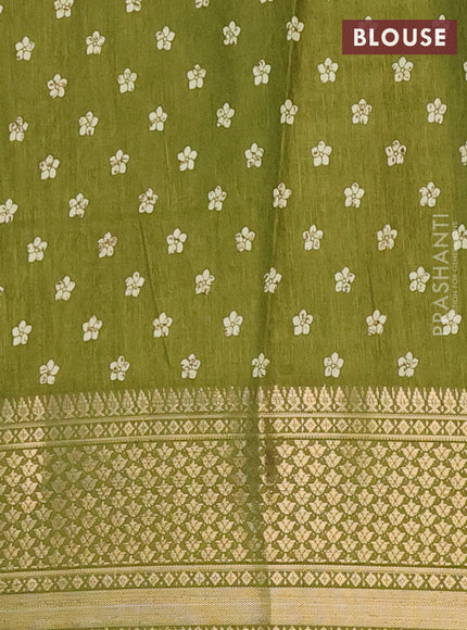 Semi dola saree mehendi green with allover prints and zari woven border