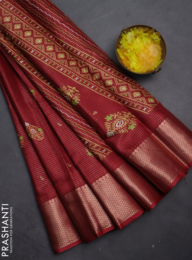 Semi dola saree maroon with allover zari weaves & butta prints and zari woven border