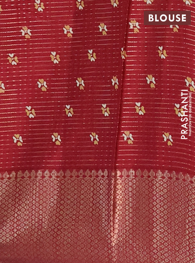 Semi dola saree maroon with allover zari weaves & butta prints and zari woven border