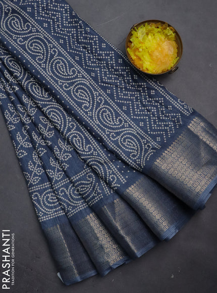Semi dola saree bluish grey with allover bandhani prints and zari woven border