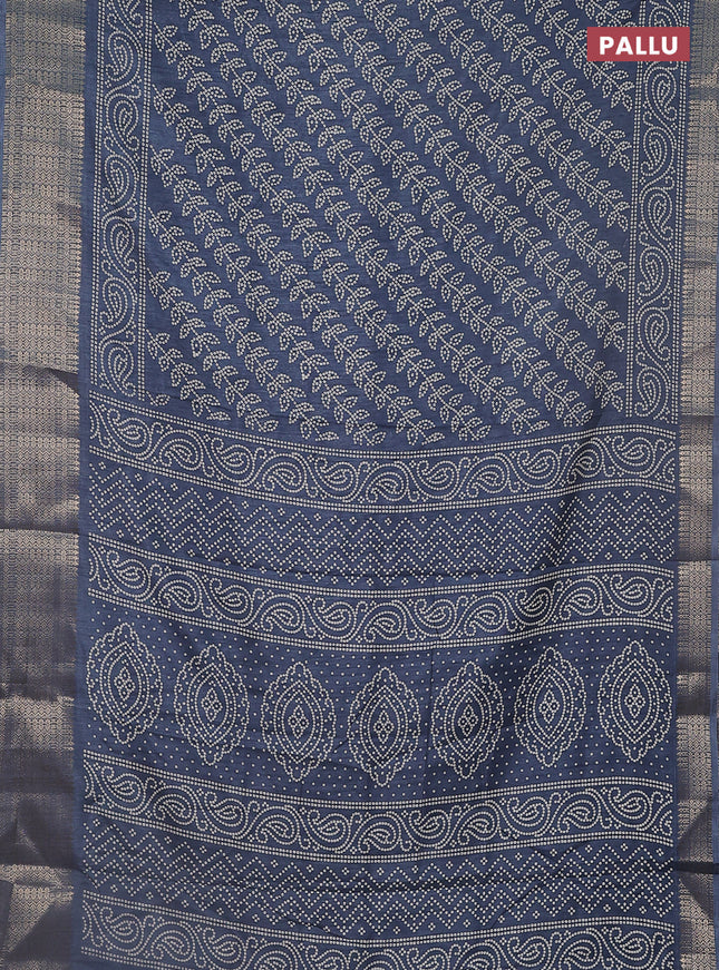 Semi dola saree bluish grey with allover bandhani prints and zari woven border