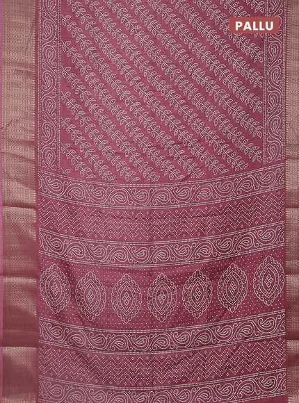 Semi dola saree mauve pink with allover bandhani prints and zari woven border