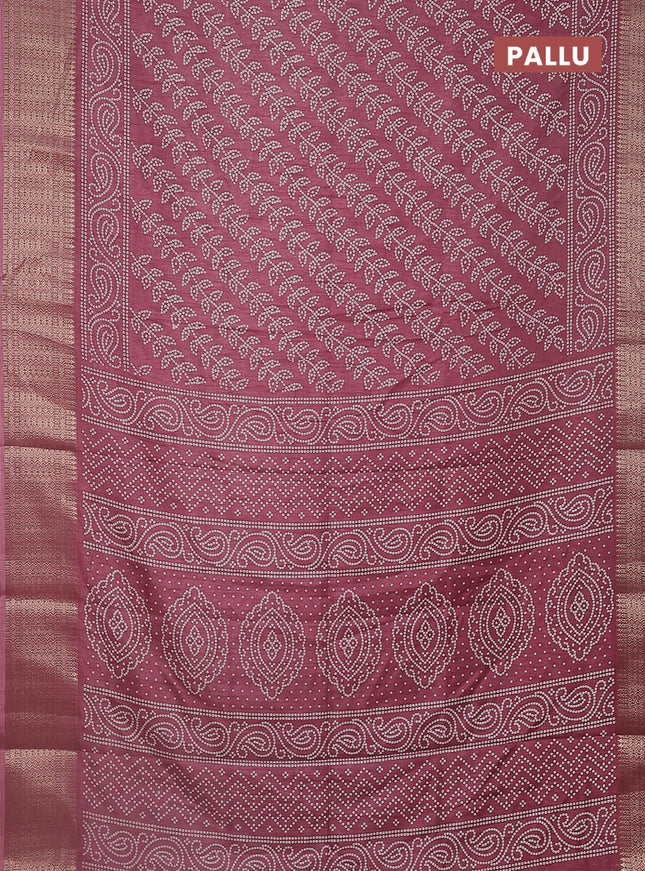 Semi dola saree mauve pink with allover bandhani prints and zari woven border