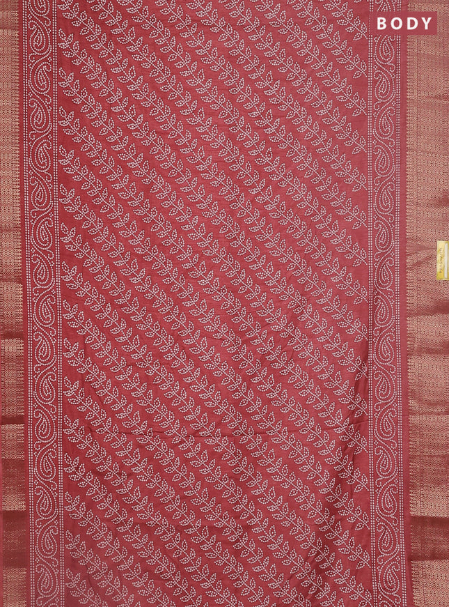 Semi dola saree pastel maroon with allover bandhani prints and zari woven border