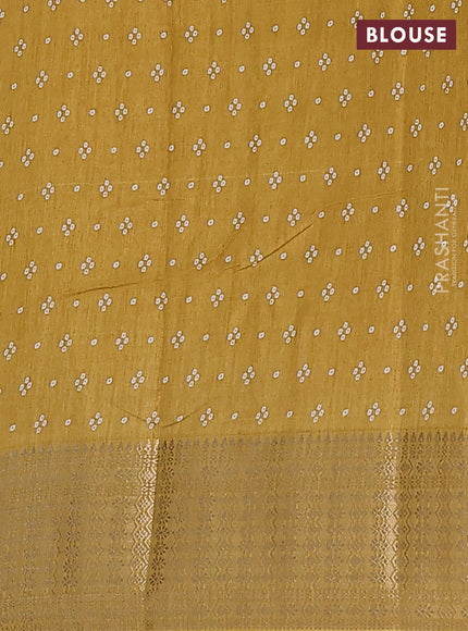 Semi dola saree mustard shade with allover bandhani prints and zari woven border