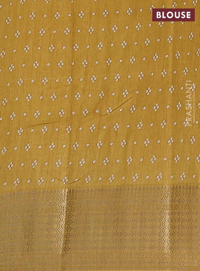 Semi dola saree mustard shade with allover bandhani prints and zari woven border