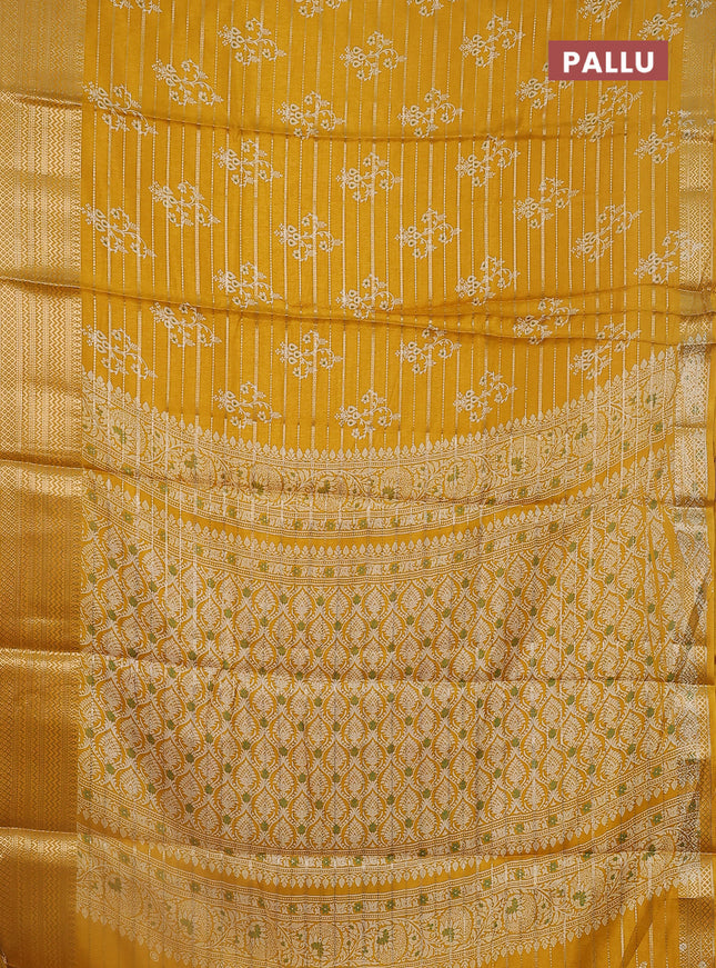 Semi dola saree mustard yellow with allover zari weaves & butta prints and zari woven border