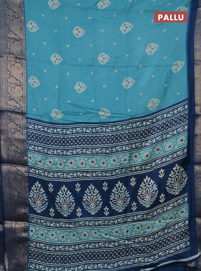 Semi dola saree teal blue and peacock blue with butta prints and zari woven border