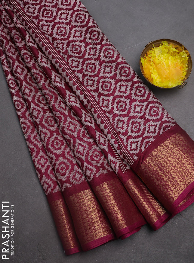 Semi dola saree wine shade with allover prints and zari woven border