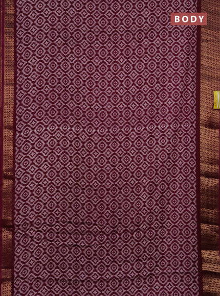 Semi dola saree wine shade with allover prints and zari woven border