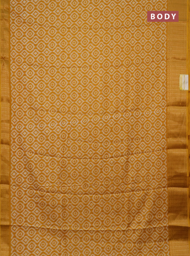 Semi dola saree mustard yellow with allover prints and zari woven border
