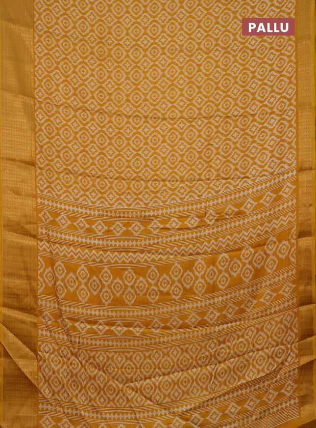 Semi dola saree mustard yellow with allover prints and zari woven border