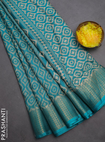 Semi dola saree teal blue with allover prints and zari woven border