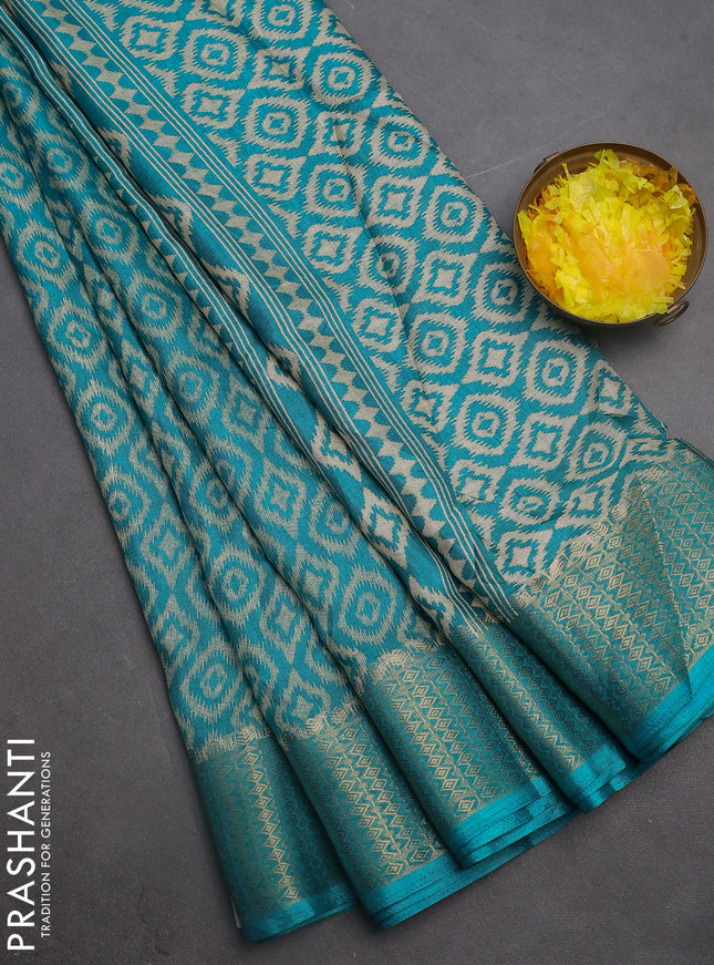 Semi dola saree teal blue with allover prints and zari woven border