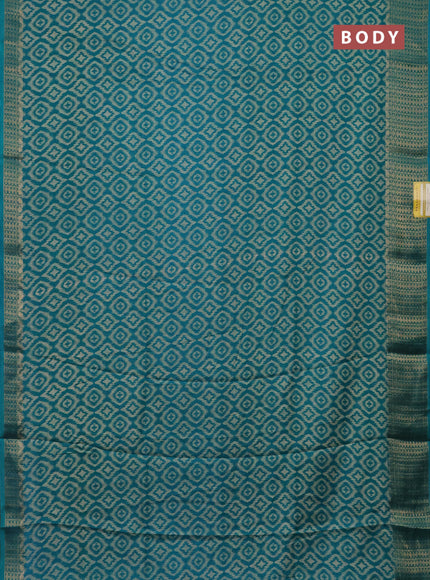 Semi dola saree teal blue with allover prints and zari woven border